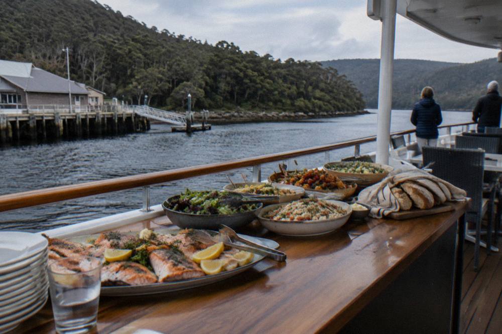 Buffet lunch spread on the deck of a river cruise vessel